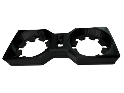 A black plastic dual cup holder insert with a 3D-printed look, shown on a white background.