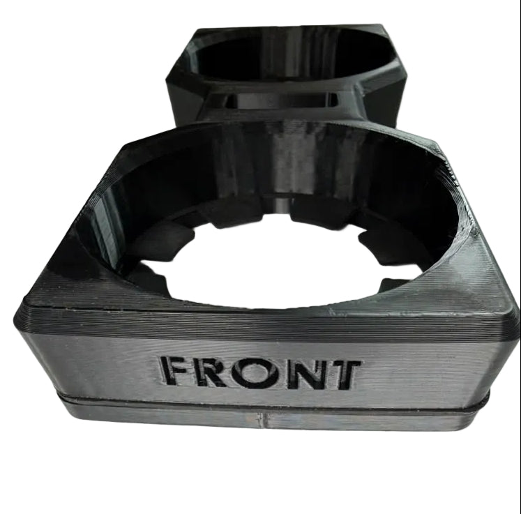 A pair of black 3D-printed cup holders, with the front one labeled 'FRONT' in raised lettering, shown on a plain white background.